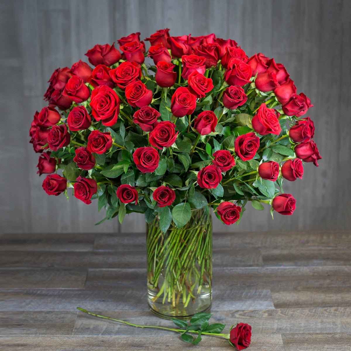 red rose and tiger lily bouquet 101 Long Stem Roses