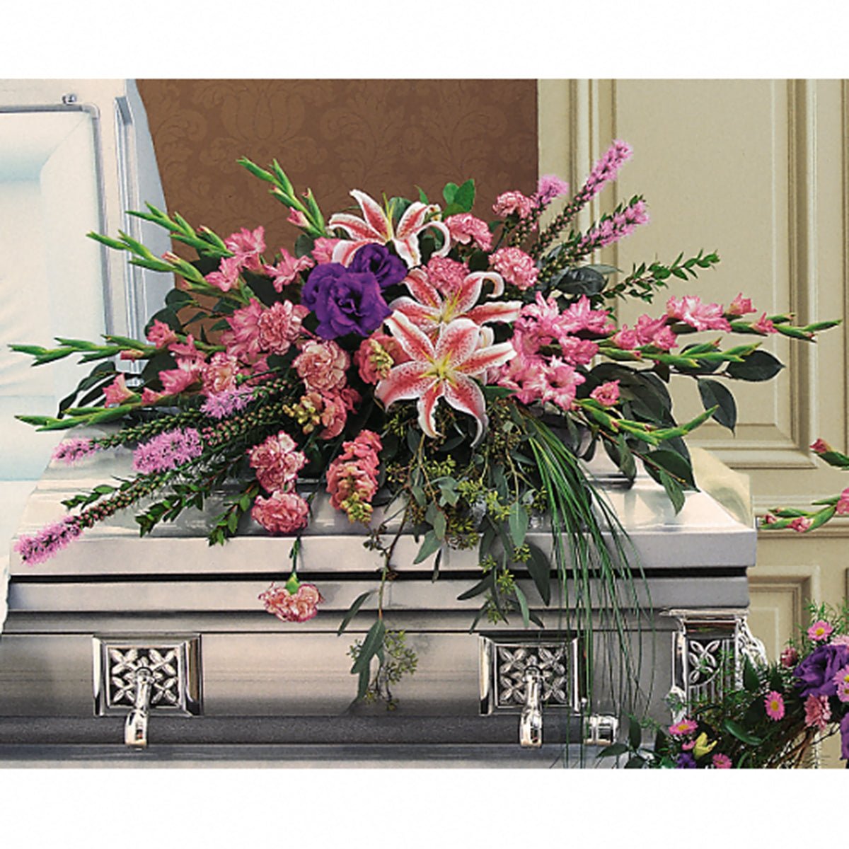 Triumphant Casket Spray - Tiger Lily Floral